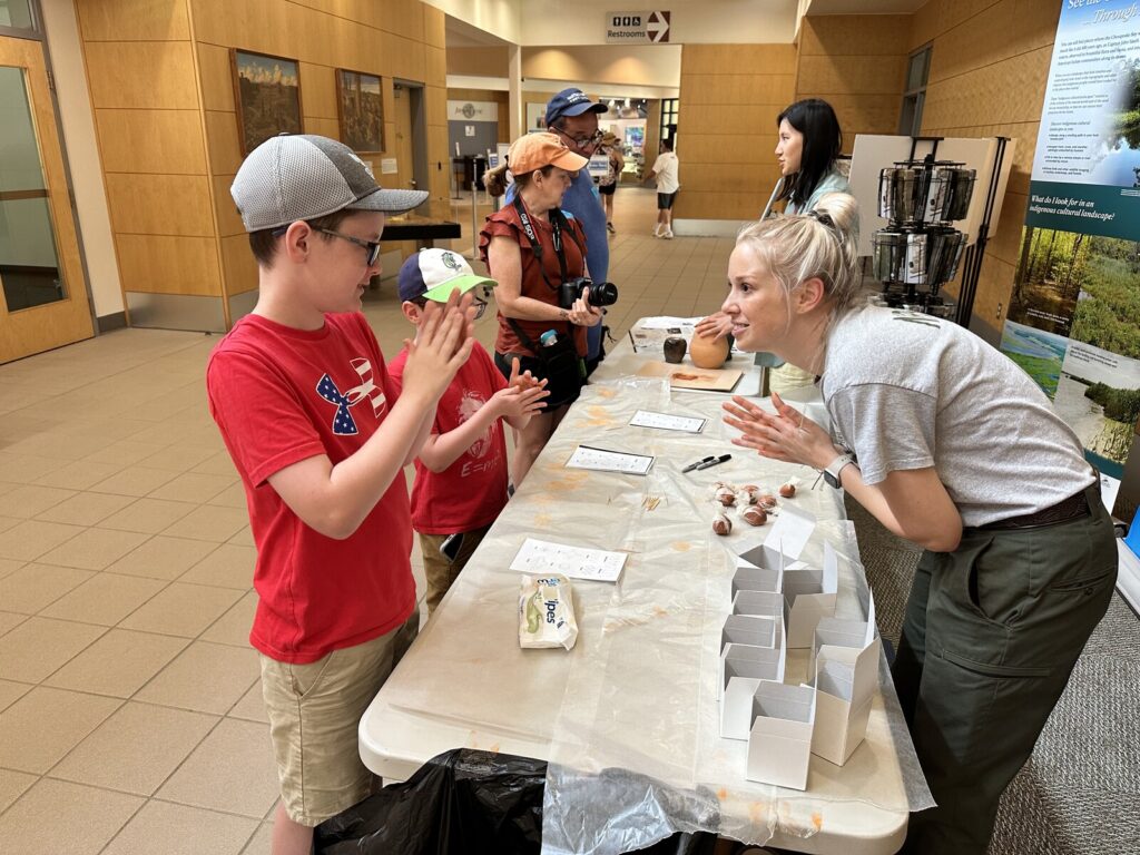 Making some pottery with a ranger. - <i>Photo by the author</i>