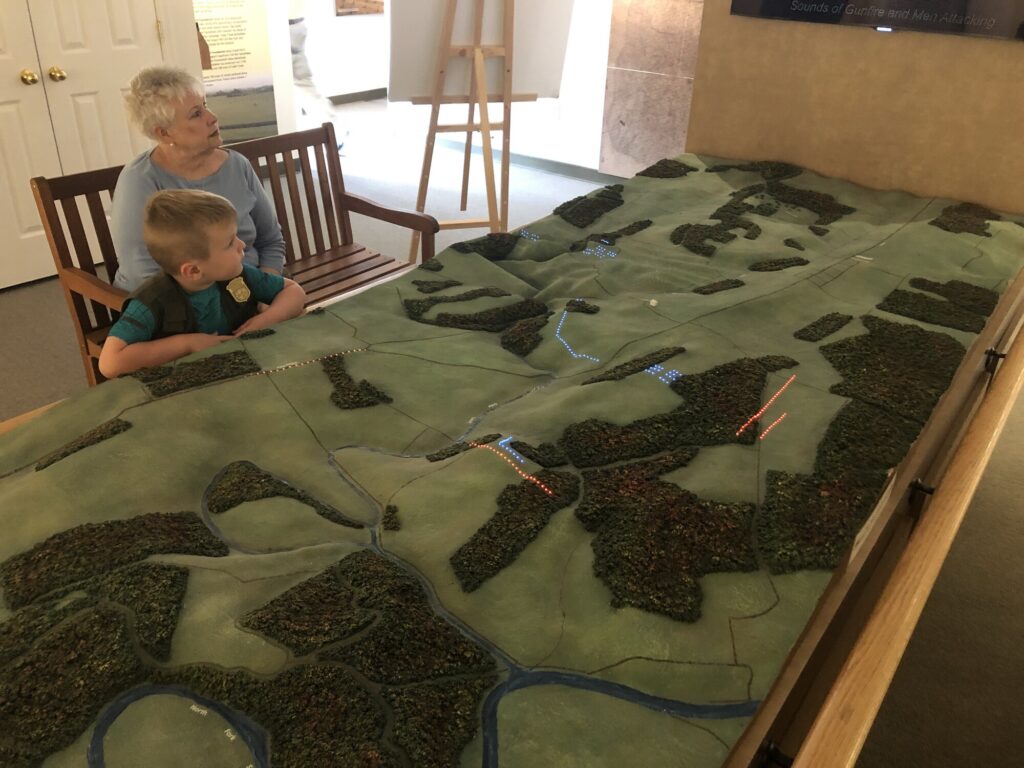 Isaac and "Nene" examine the electric map! - <i>Photo by the author</i>