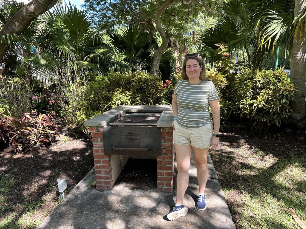 Emily with Truman's grill. - <i>Photo by the author</i>