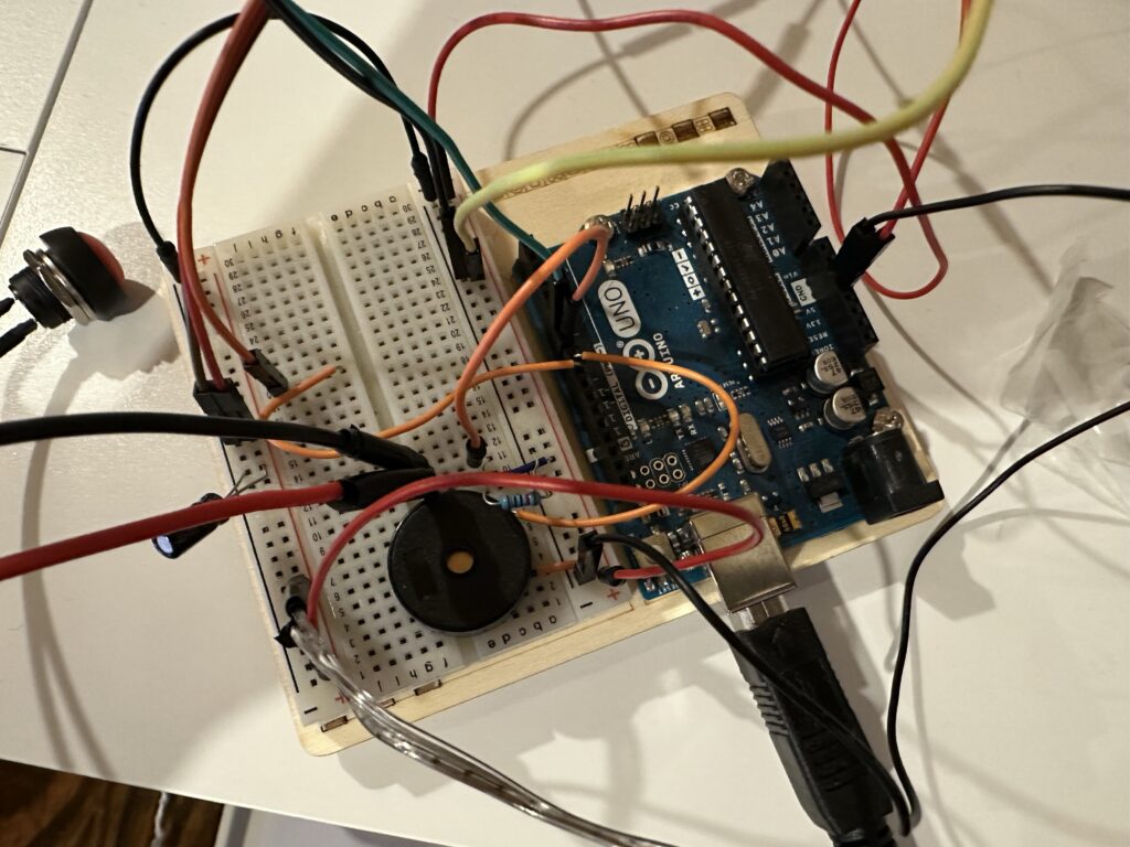 The brains of our meter - the Arduino Uno and our rather messy breadboard.