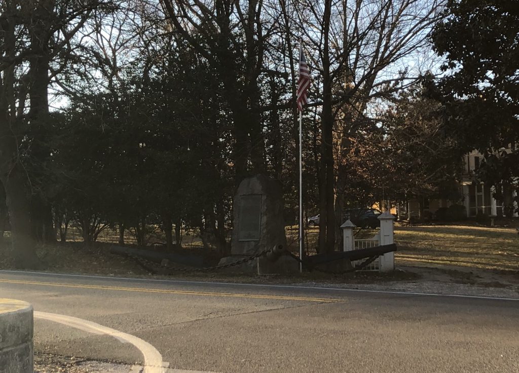 This stone monument to the Battle of Cooch's Bridge is extremely hard to access today. My hope is that the State of Delaware's purchase of the home behind the monument will eliminate this problem in the future. - <i>Photo by the Author</i>