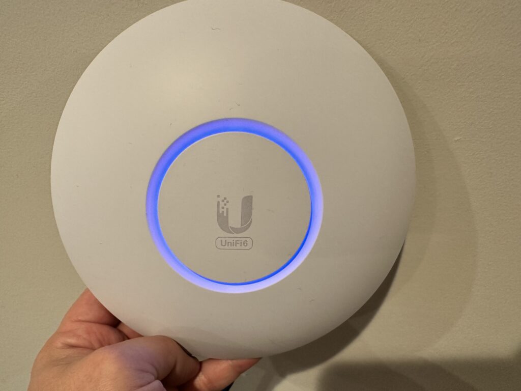 The U6-Lite Access Point - plenty for our needs, and as a refurb unit, the price was right. Looks great, works even better! - <i>Photo by the author</i>