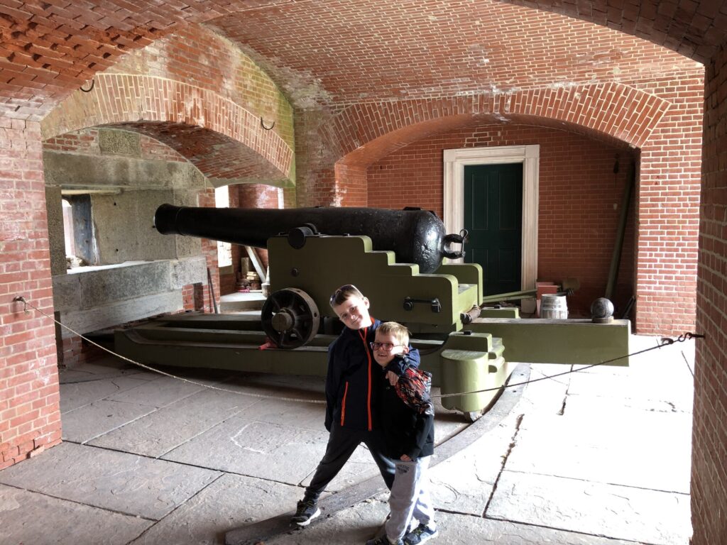 My boys with one of the big seacoast guns. - <i>Photo by the author</i>