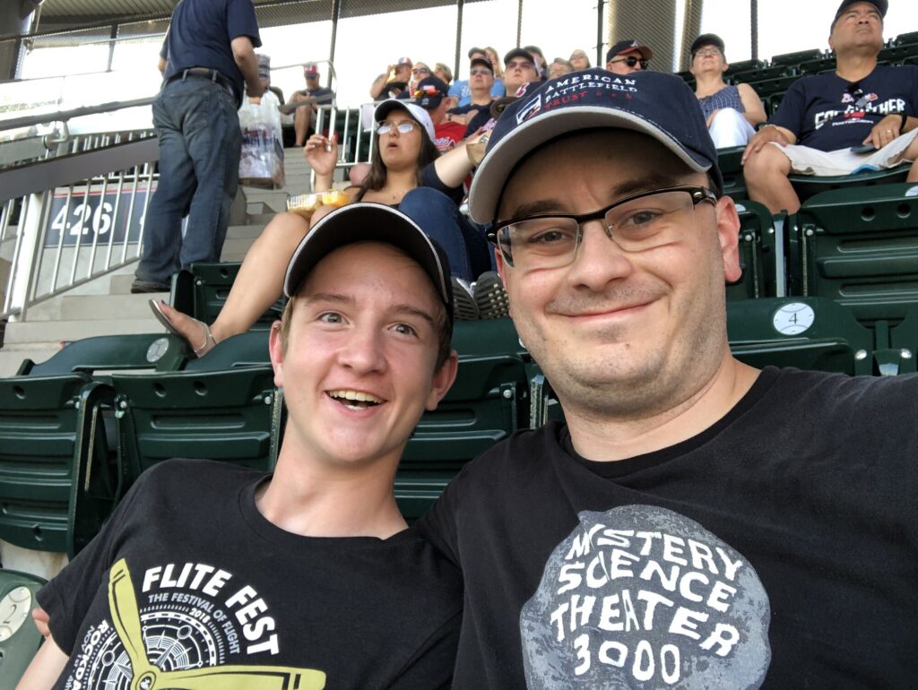 A couple of happy guys at the ball game. - <i>Photo by the author</i>