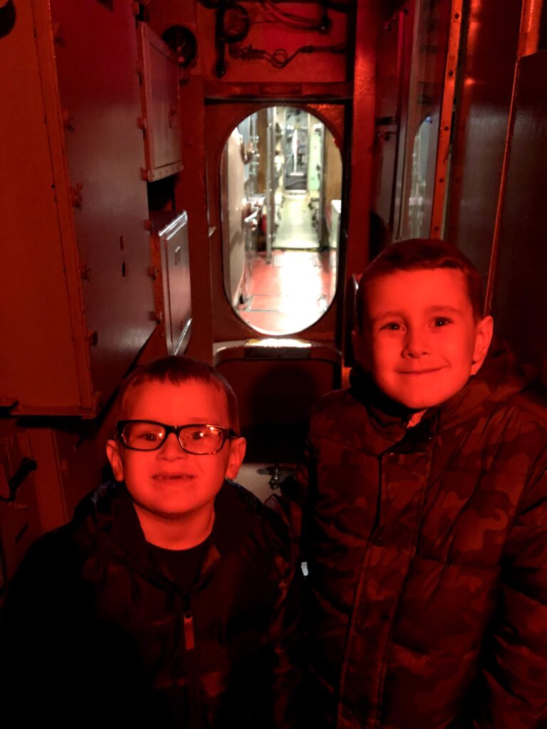 The boys in the control room aboard the <i>Becuna</i> - <i>Photo by the author</i>