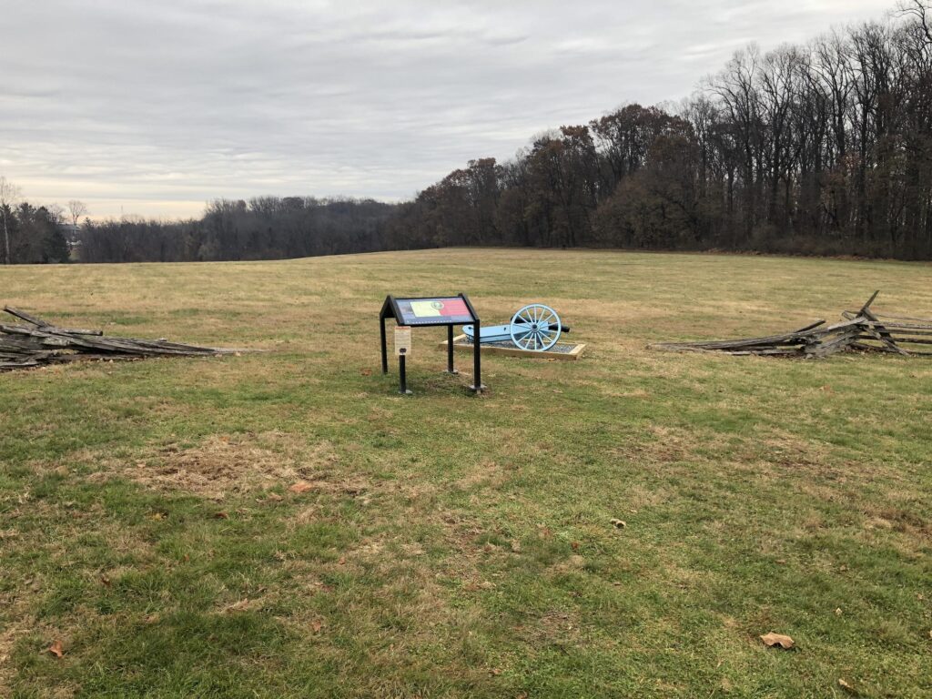 Looking toward the site of the American encampment, past the disabled artillery piece. - <i>Photo by the author</i>
