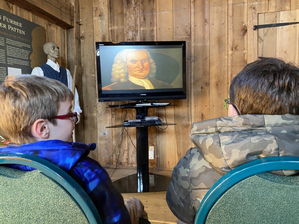 Checking out the orientation film at the visitors center. - <i>Photo by the author</i>