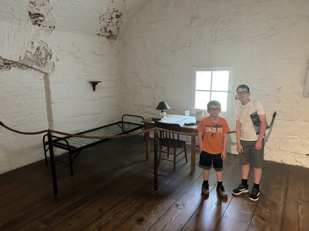 The boys in the cell that housed Jefferson Davis. - <i>Photo by the author</i>