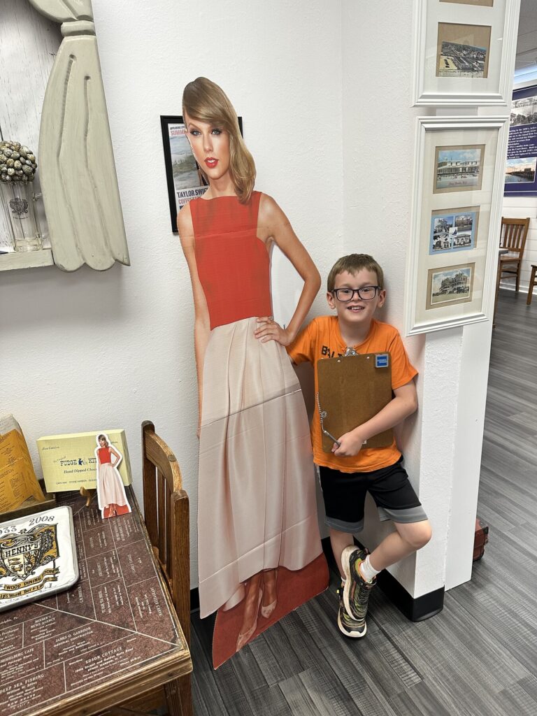 Isaac hanging out with local celebrity, Taylor Swift. - <i>Photo by the author</i>