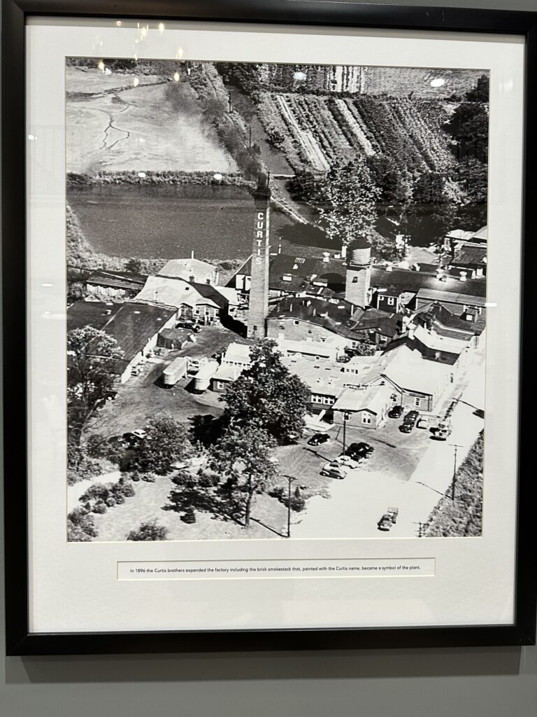 An aerial photo of the paper mill hanging in the dining room. - <i>Photo by the author</i>