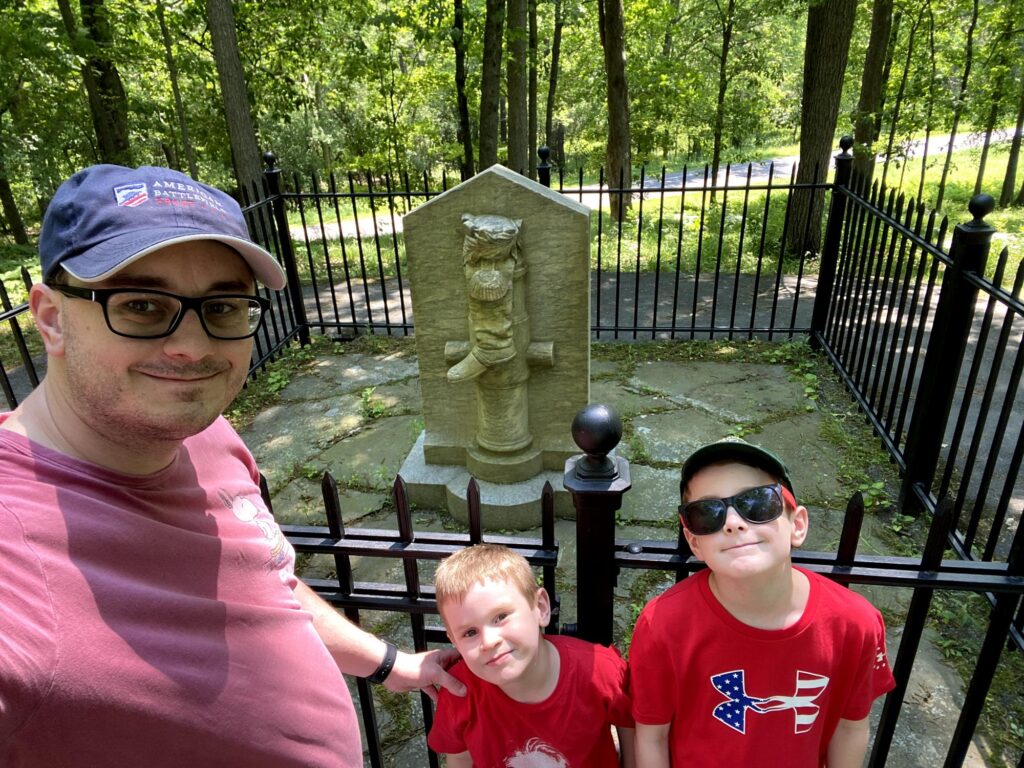 The boys and I posing in front of the "Boot Monument" commemorating he-who-shall-not-be-named. - <i>Photo by the author</i>