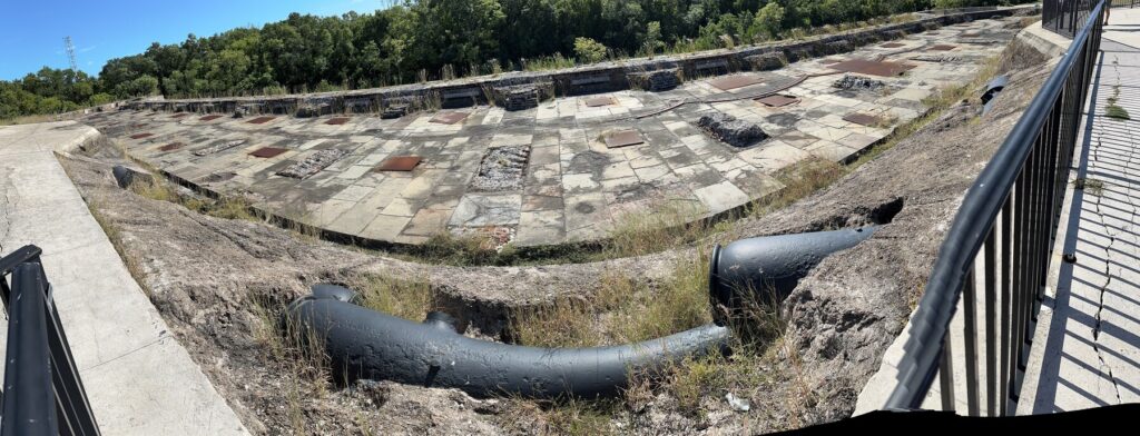 A panorama showing some of the old guns poking out of the concrete. - <i>Photo by the author</i>